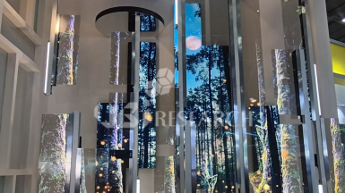 Exhibition scenes from Touch Taiwan 2026 showcasing next-generation Micro-LED displays and automotive smart cockpits by AUO, Innolux, and PlayNitride.